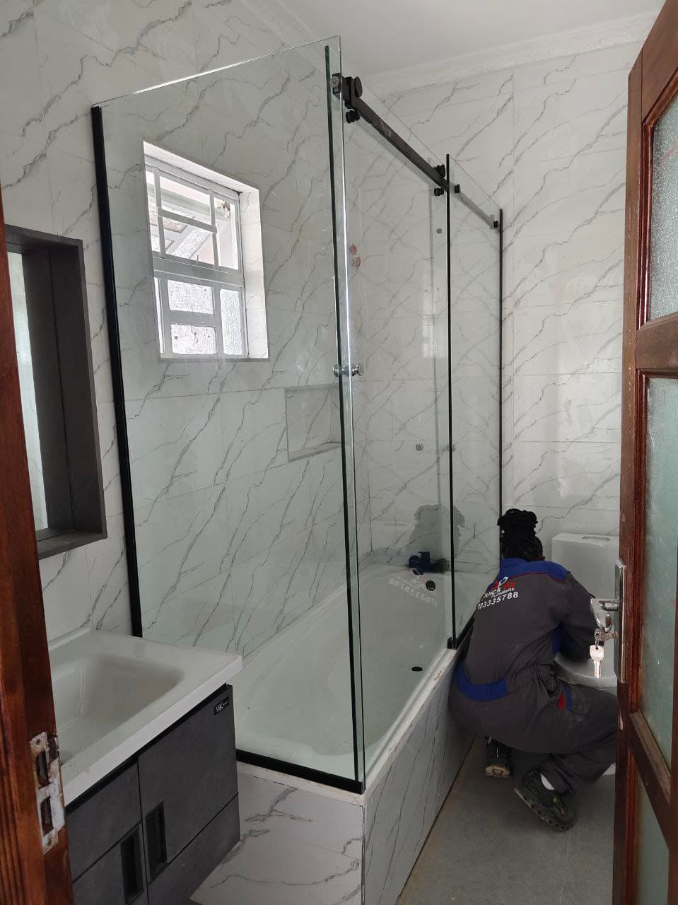 Bathtub sliding shower door